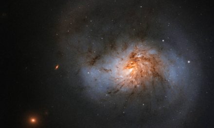 Hubble Sees Dusty Galaxy With Supermassive Center