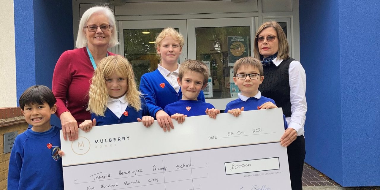 Housebuilder’s donation helps to improve primary school playground in Temple Herdewyke
