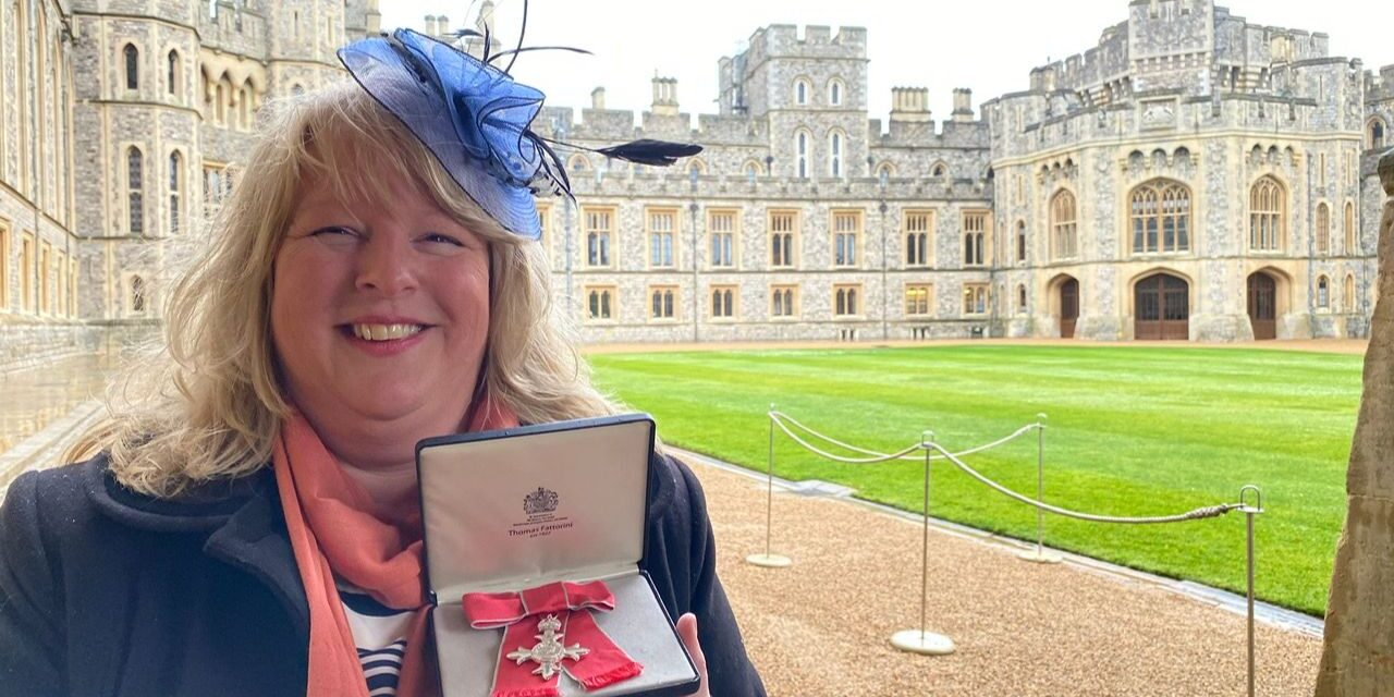 Elizabeth collects MBE in Windsor ceremony