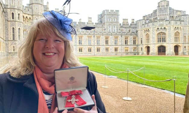 Elizabeth collects MBE in Windsor ceremony