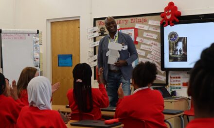 Leeds Primary School pupils welcome FBI Special Agent Miguel Clarke for talk on online safety.