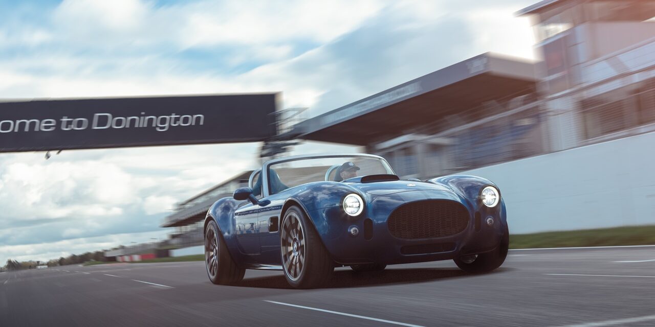 AC Cars celebrates anniversary with production of AC Cobra GT Roadster at UK facility and bigger Donington Park HQ, as it wraps next model for reveal
