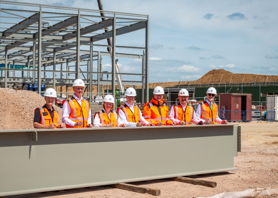 Final structural beam signed by Rolls-Royce Directors as landmark £300 million extension reaches key milestone