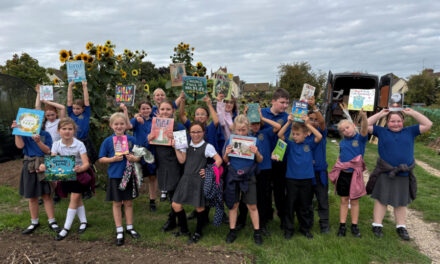 LOCAL SCHOOL CHILDREN AND RETIREES SHARE THEIR FAVOURITE BOOKS DURING AN AFTERNOON TO CELEBRATE GRANDPARENTS DAY IN STOW-ON-THE-WOLD