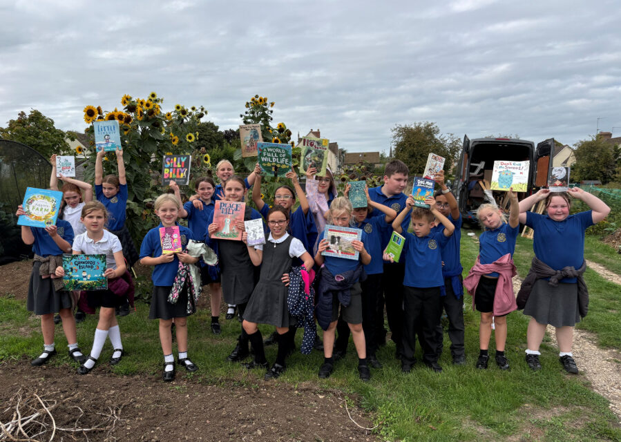 LOCAL SCHOOL CHILDREN AND RETIREES SHARE THEIR FAVOURITE BOOKS DURING AN AFTERNOON TO CELEBRATE GRANDPARENTS DAY IN STOW-ON-THE-WOLD